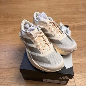 NWT Adidas Adizero Evo SL Women's Cream and Silver Athletic Shoes. Size 8 Women.